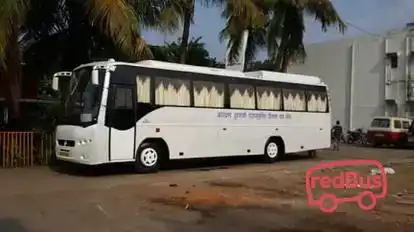 Triguna Travels Bus-Side Image