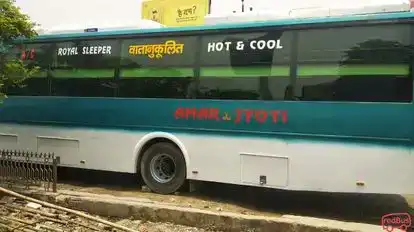 Amar Jyoti Carriers Pvt. Ltd. Bus-Side Image