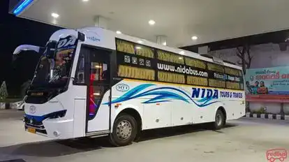 NIDA TOURS & TRAVELS Bus-Side Image