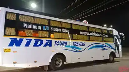 NIDA TOURS & TRAVELS Bus-Side Image