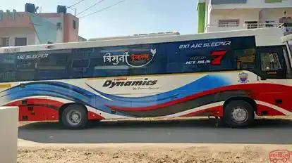 Trimurti Tours and Travels Bus-Side Image