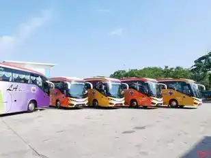 LA Holidays Travel and Tours Sdn Bhd Bus-Side Image